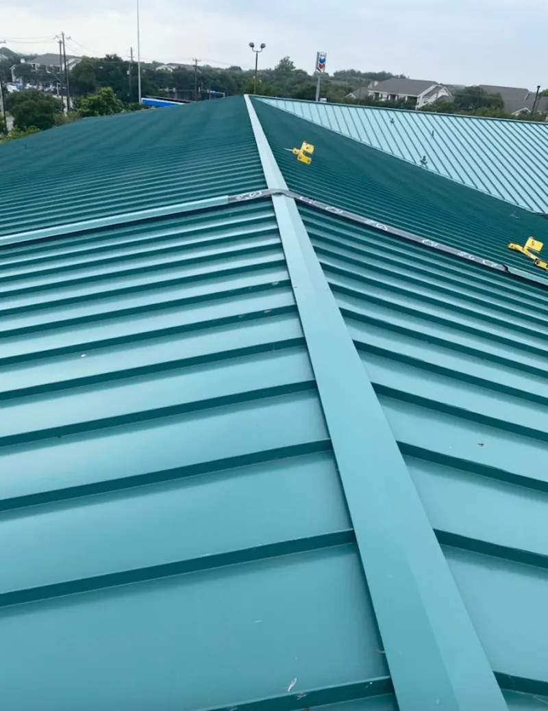 Green commercial metal roof ridge and valley for Metal Roof Repair in Fleming Island